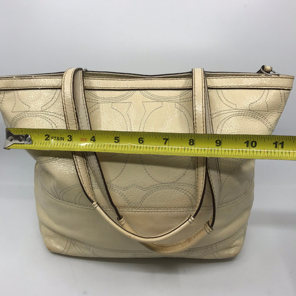 cream patent bag